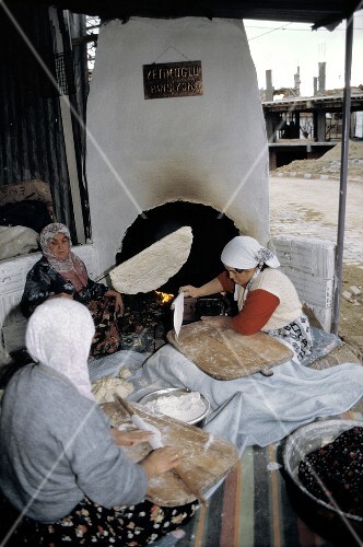 Women In Turkey Baking Flat Bread