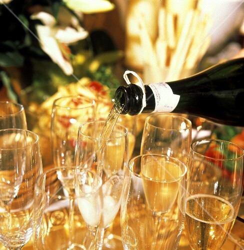 Filling Champagne Glasses with Champagne