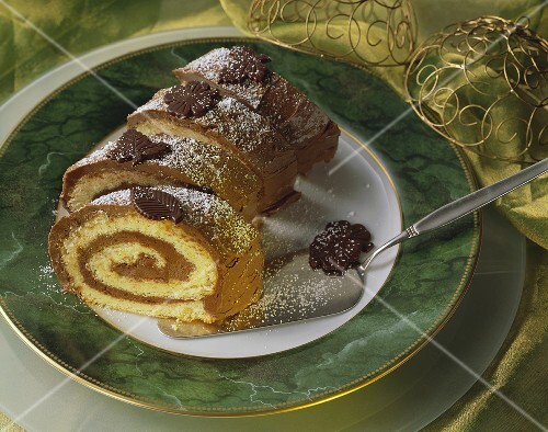 Buche de Noel, sliced, cake slice beside it
