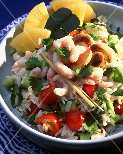 Rice salad with cashews, pineapple, cherry tomatoes & shrimps