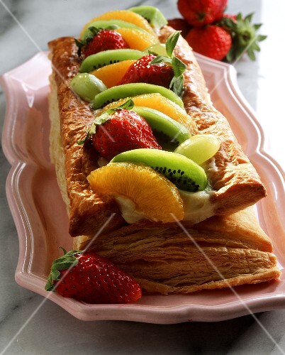 Puff pastry slice with cream filling and fresh fruit