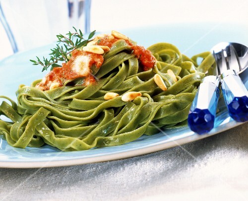 Tagliatelle with tomato and Roquefort sauce and pine nuts