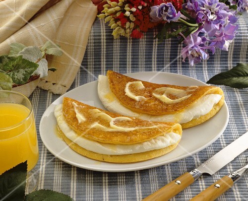 Cachapa (sweetish corn pancakes stuffed with cheese)
