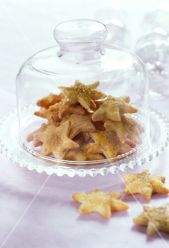 Cinnamon stars under a glass cover