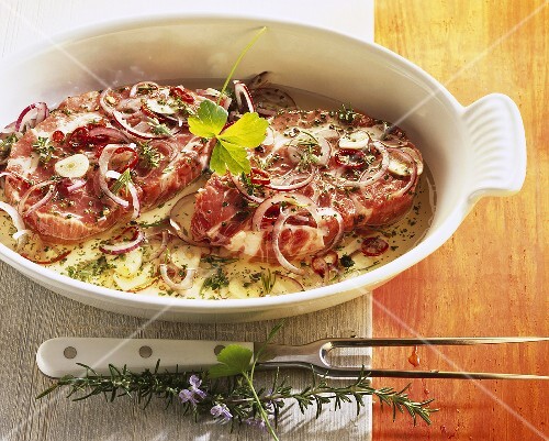 Marinated pork neck steaks