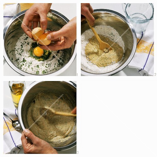Making herb noodles (spaetzle) (mixing the dough)