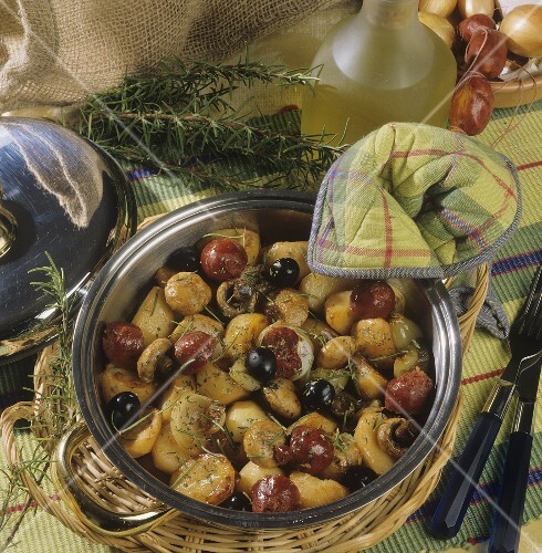 Potato stew with mushrooms, chorizo and olives