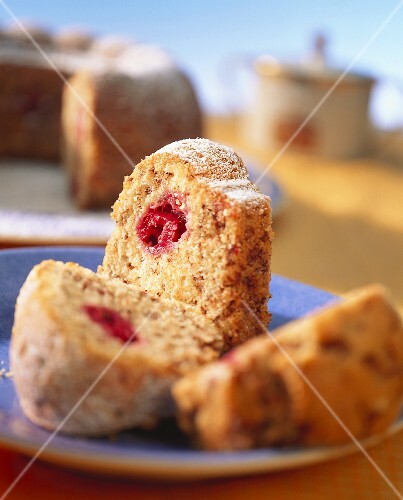 Raspberry chocolate cake with icing sugar
