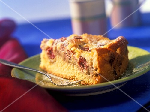 Piece of rhubarb cake with sour cream topping