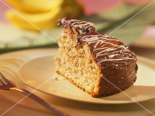 Piece of banana cake with chocolate icing