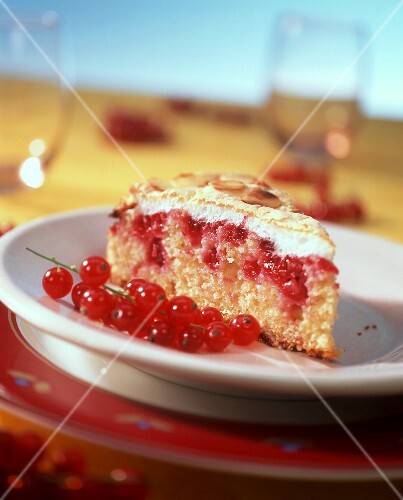 Piece of redcurrant and almond meringue cake
