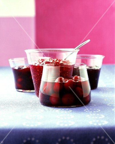 Jams and cherry compote in jars