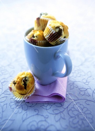 Mini blueberry muffins in blue cup
