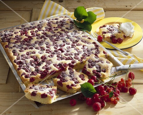 Cherry marzipan cake on baking tray