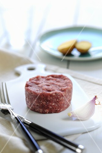 Mince shaped into a round patty