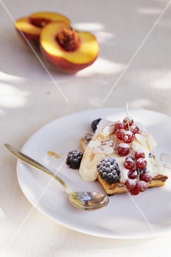 Waffle with blackberries, redcurrants and crème fraîche