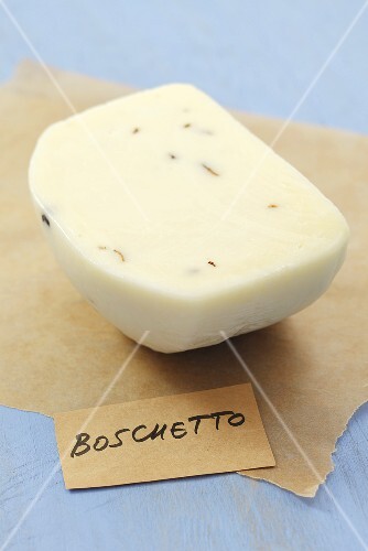 Boschetto cheese (Italian semi-hard cheese with truffle) on paper