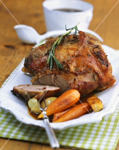 Veal shank on root vegetables