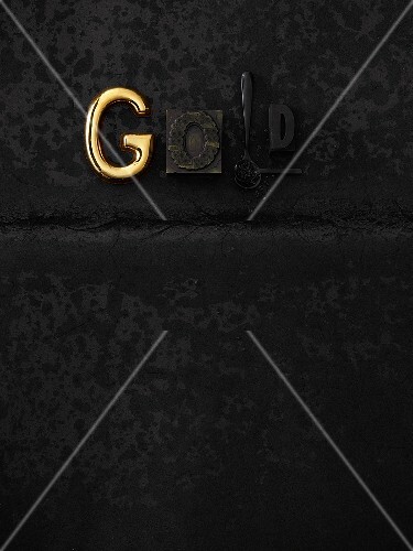 The word 'Gold' on black background