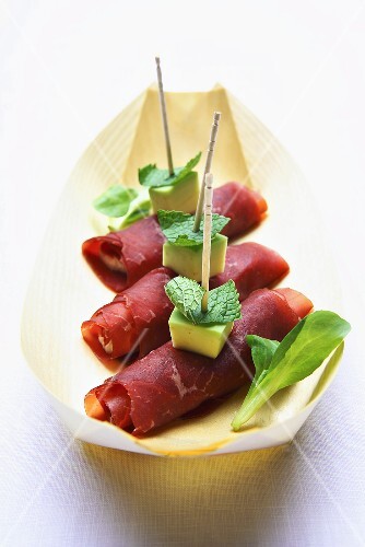 Bresaola rolls filled with avocado