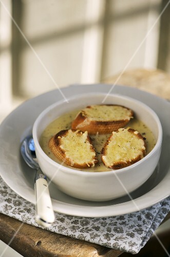 Onion soup with cheese baguette