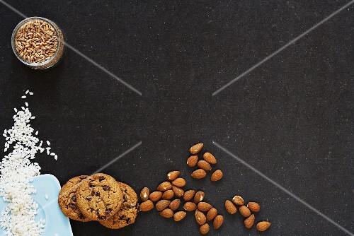 Still life with almonds, chocolate chip cookies, short-grainrice and cereal