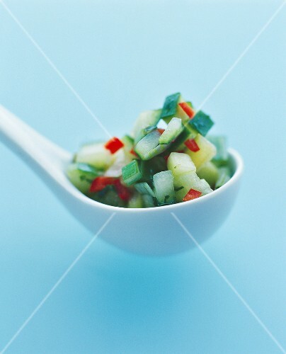 Cucumber salsa on spoon