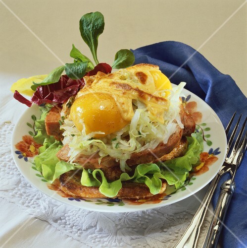 Leberkäse (type of meatloaf), white cabbage & eggs on toast