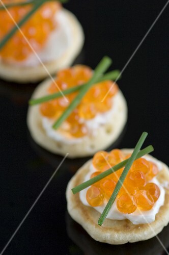 Salmon caviar on blinis