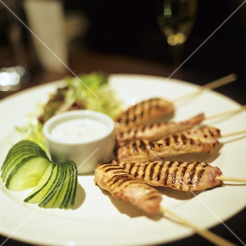 Grilled chicken kebabs with sour cream