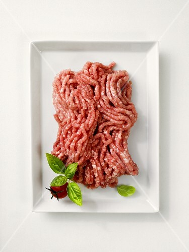 Fresh minced pork on a rectangular plate