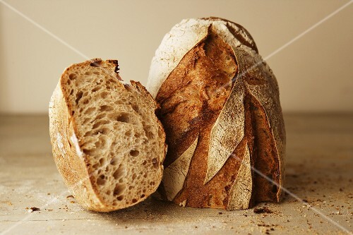 Farm bread, partly sliced