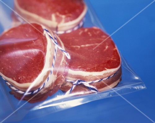 Beef fillet wrapped in bacon and tied with string