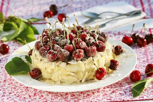 Sponge cake with sugared cherries