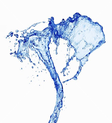 Splashing stream of water against white background