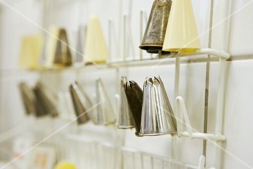 Various piping nozzles on a rack