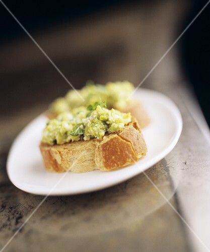Avocado on two baguette slices