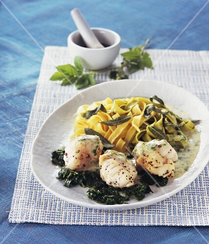 Fried monkfish with tagliatelle, various herbs
