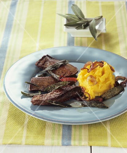 Fried calf's liver with sage, saffron mash, onion rings