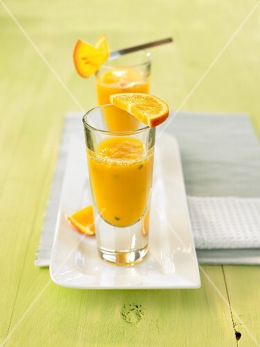 Passion fruit shake in two aperitif glasses