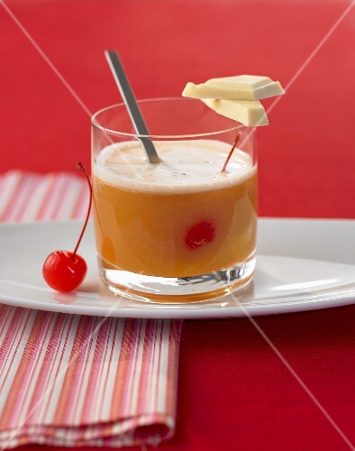 Passion fruit and pineapple drink with almond syrup