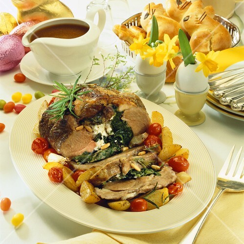 Leg of lamb with spinach & sheep's cheese stuffing & rosemary potatoes