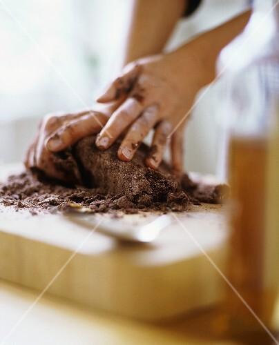 Kneading chocolate pastry dough