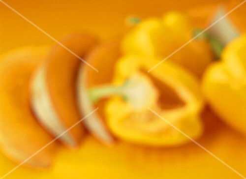 Pieces of honeydew melon & yellow pepper (artistic shot)