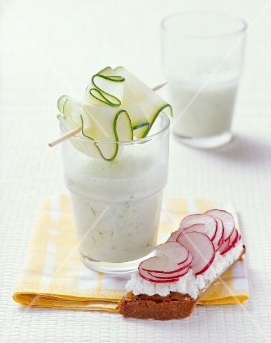 Kefir with cucumber and sliced radishes on bread
