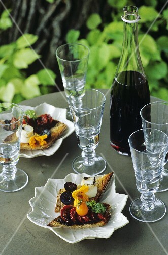 Assorted crostini on garden table