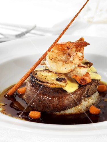 Steak with shellfish and prawns on crayfish mashed potato