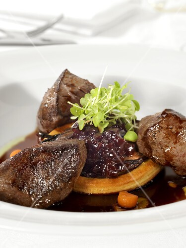 Beef steaks with gravy and cress