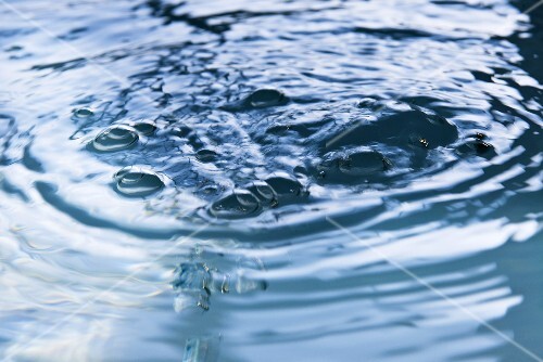 Bubbling water in swimming pool