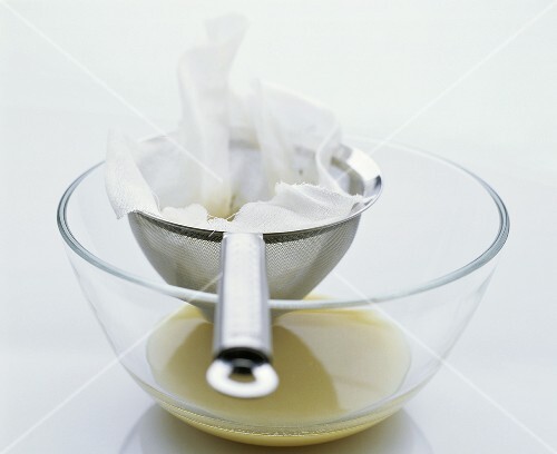 Straining fish stock